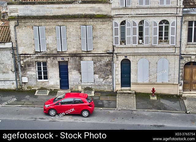red car parked on Avenue President Wilson, Angouleme, Charente Department, Nouvelle-Aquitaine, France