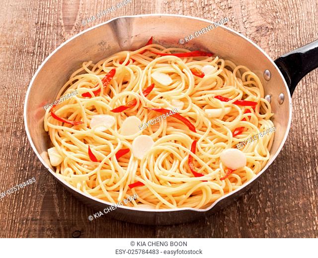 close up of rustic traditional italian aglio olio spaghetti pasta