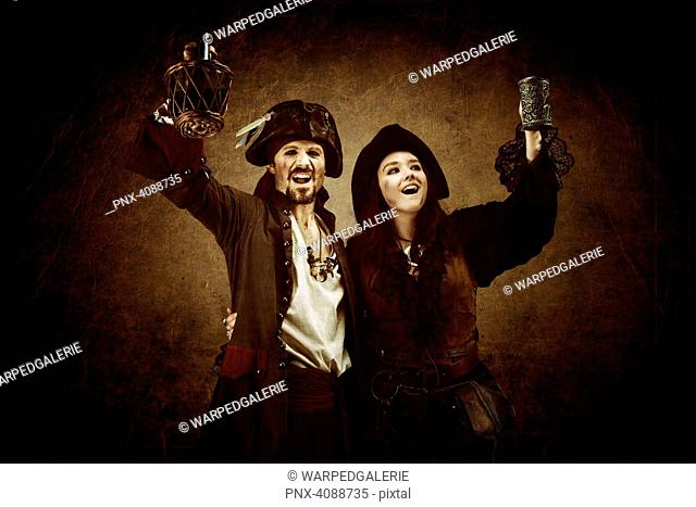 Pirate couple toasting