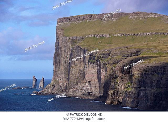 Risin and Kellingin sea stacks, under 350 m high cliffs, near Eidi, Esturoy, Faroe Islands Faroes, Denmark, Europe