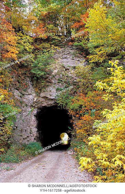 Tunnel in Rocheport Missouri with light beyond on the Rails to Trails project, Missouri USA