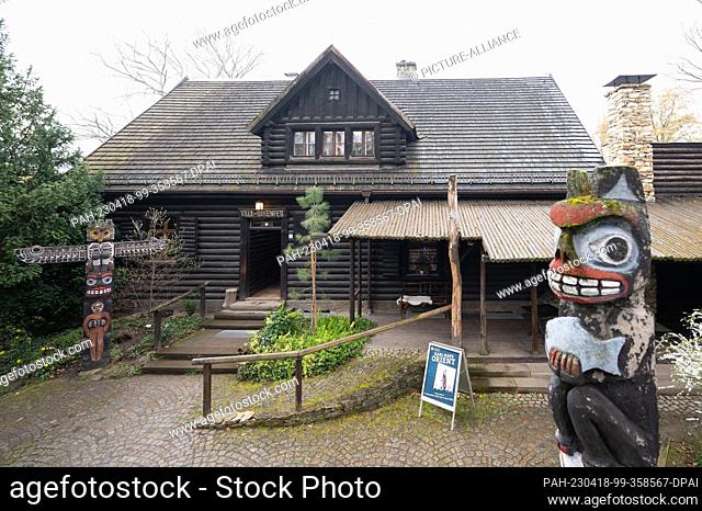 18 April 2023, Saxony, Radebeul: Totem poles stand in front of the ""Villa Bärenfett"" in the Karl May Museum. Donations made it possible to repair the historic...