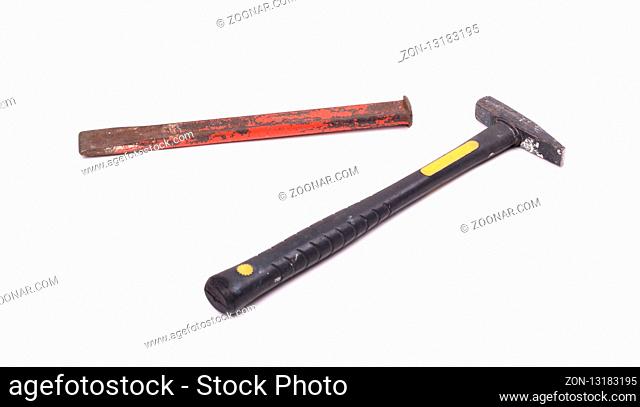 Cold chisel and hammer isolated on a white background