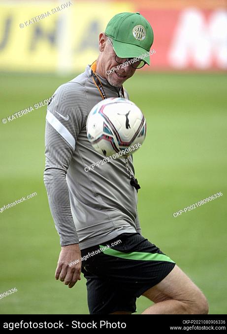 Coach of Ferencvarosi TC Budapest Peter Stoger poses for photographer during the training session prior to Football Champions League 3rd qualifying round return...