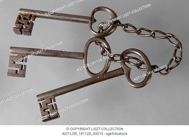 Bunch of keys: three iron keys with solid key stems and cruciform beards in beard, connected by means of an iron chain, key bunch key iron value iron