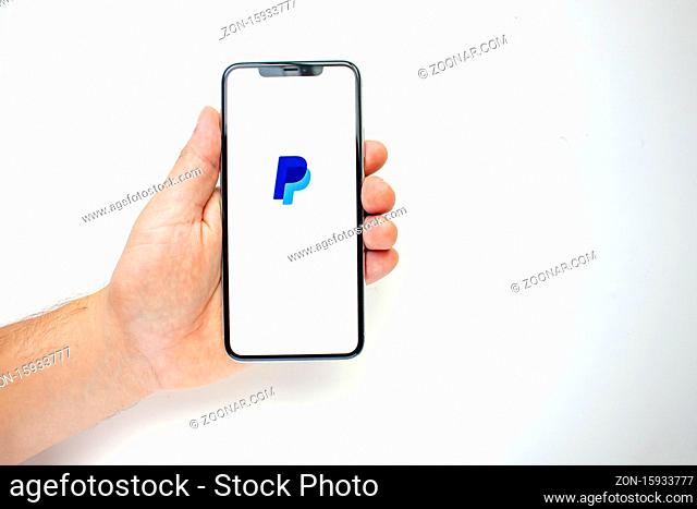 Calgary, Alberta, Canada. Aug 15, 2020. A person holding an iPhone 11 Pro Max with the PayPal App