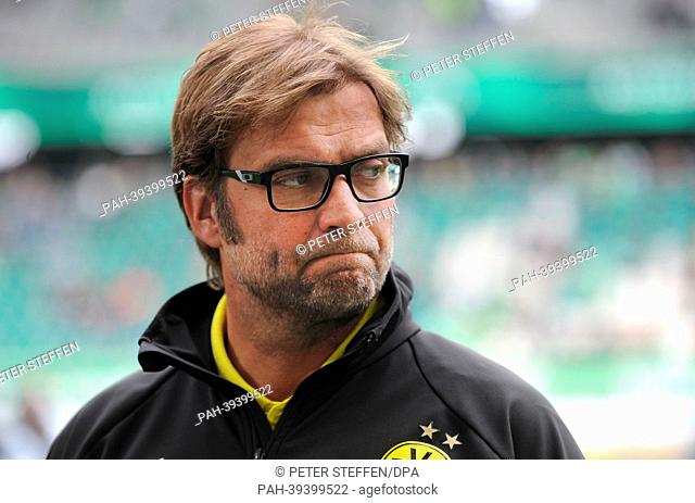 Dortmund's coach Juergen Klopp gestures prior to the start of the match VfL Wolfsburg and Borussia Dortmund in Volkswagen-Arena in Wolfsburg, Germany