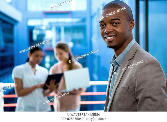 Business executive smiling in office