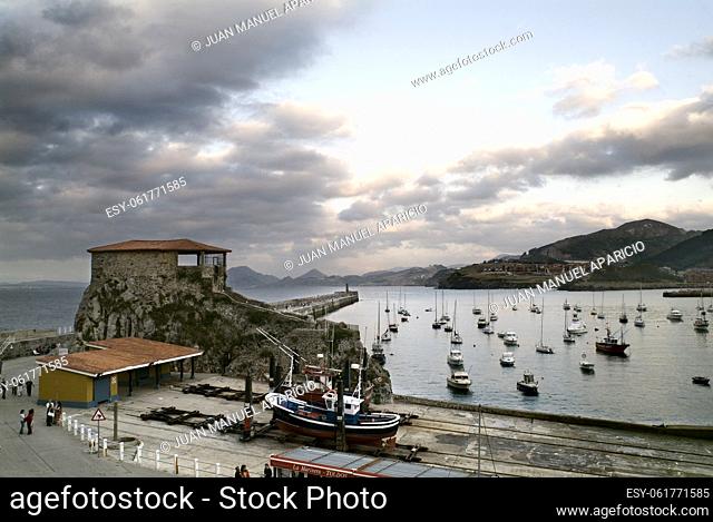 St. Guillen ramp and Chapel of Santa Ana in Castro Urdiales with a storm threatening sky, Cantabria, Spain