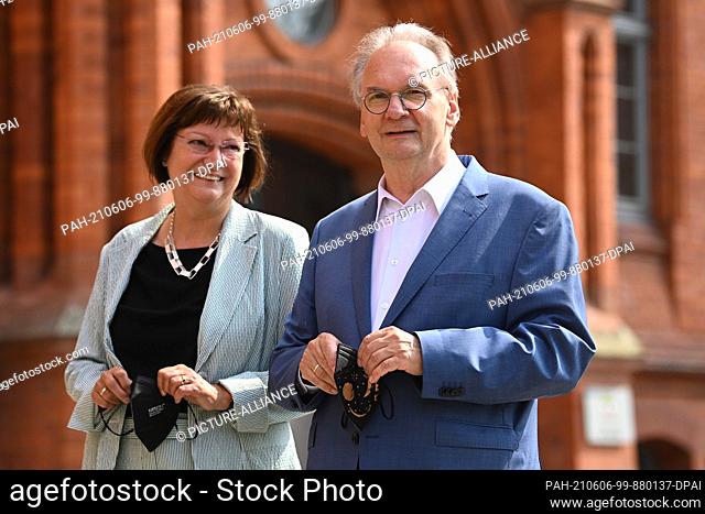 06 June 2021, Saxony-Anhalt, Wittenberg: Reiner Haseloff (CDU), Minister President of Saxony-Anhalt, and his wife Gabriele Haseloff arrive at the polling...