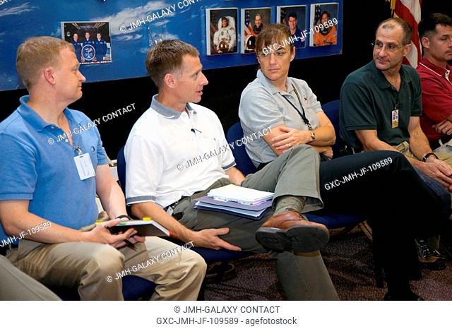 Astronauts Eric A. Boe (left), STS-126 pilot; Christopher J. Ferguson, commander; Heidemarie M. Stefanyshyn-Piper, Donald R. Pettit and Robert S