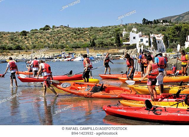 People in canoes. Casa-Museo Salvador Dalí. Port Lligat, small village located in a small bay on Cap de Creus peninsula, on the Costa Brava of the Mediterranean...