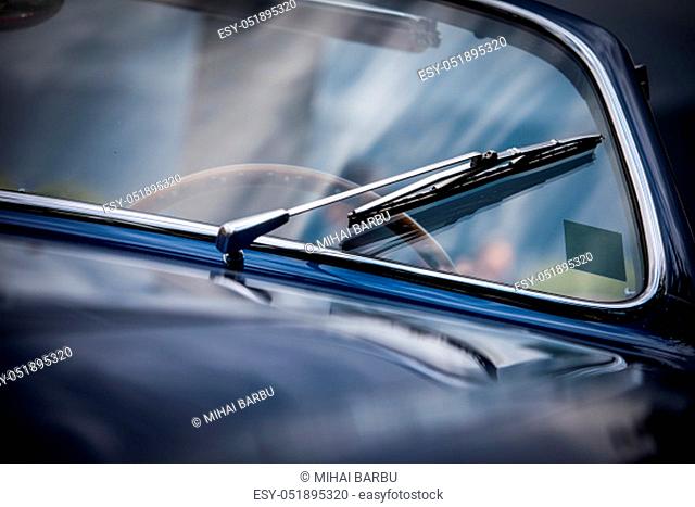 Close up shot of vintage car windscreen wipers