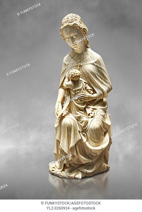 Medieval Gothic ivory statuette of the Virgin and Child known as â. œa La Suppliqueâ. . (supplication) made in Paris oat the beginning of the the 15th century