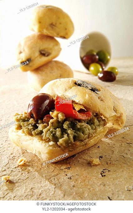 Olive tapinade on mini chiabatta bread rolls