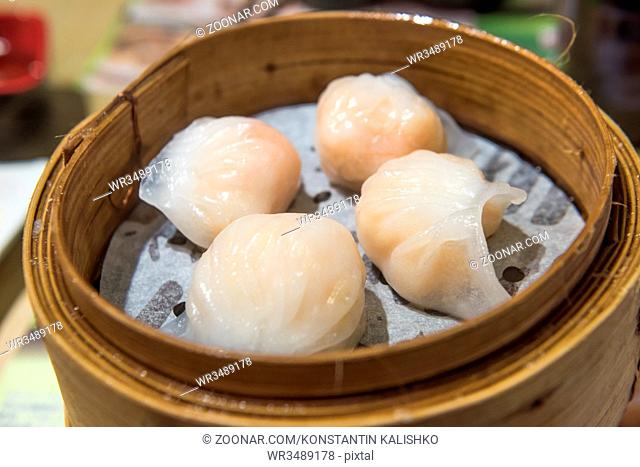 Dim Sum, traditional Cantonese dumplings, cooked in bamboo steamer