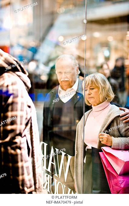 A senior couple window-shopping Stockholm Sweden