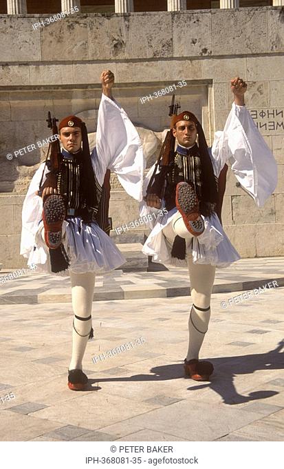 Athens - Evzone guards at the Tomb of the Unknown Soldier in front of the Greek Parliament Building