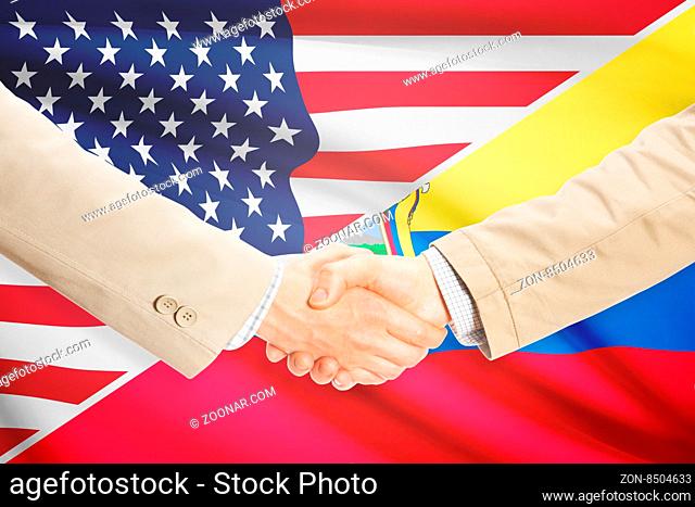 Businessmen shaking hands - United States and Ecuador