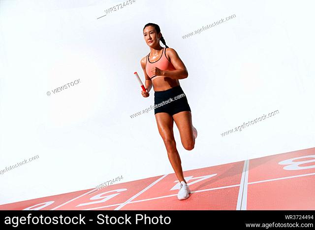 Female athletes relay race