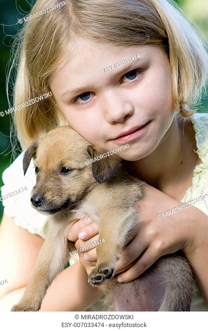 little girl and her young dog