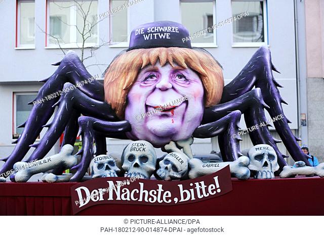 A political caricature float featuring ""German Chancellor Angela Merkel, CDU, as a black widow spider"" takes part in the Rosenmontag (Shrove Monday) carnival...