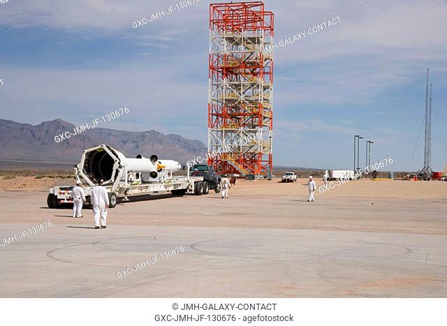 The launch abort system for the Pad Abort-1 (PA-1) flight test is rolled out to the launch pad in preparation for the test at the U.S