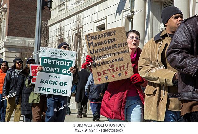 Detroit, Michigan - Detroit residents picket the Detroit Athletic Club, where Governor Rick Snyder was speaking, to protest Snyder's plan to appoint an...