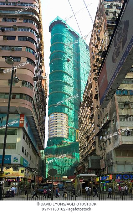 The Hanoi Road high rise project under construction, bamboo scaffolding, in the Tsim Sha Tsui area of Kowloon, Hong Kong, China