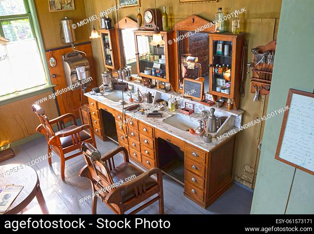 Enkhuizen, the Netherlands - August 7, 2022: Old-fashioned traditional Dutch barbershop in the open air museum in Enkhuizen, the Netherlands