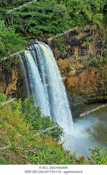 Kauai Hawaii Wailua Falls famous TV falls with water flow into lake tourist attraction