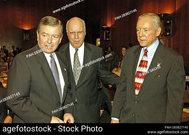 United States Attorney General John Ashcroft, left, arrives at the US Senate Judiciary Committee with Chairman Patrick Leahy (Democrat of Vermont), center