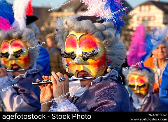 Basel, Switzerland - March 10, 2014: The tradtional carnival parade with dressed up people