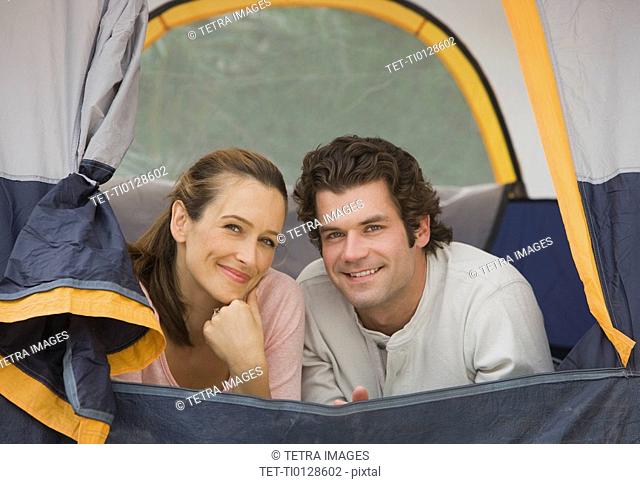 Couple laying in tent