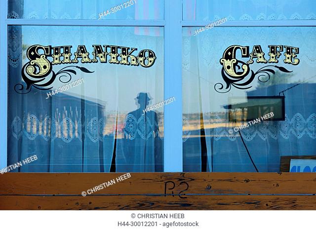 USA, Pacific Northwest, Oregon, Wasco County, Shaniko ghost town, reflectionin Shaniko Cafe window