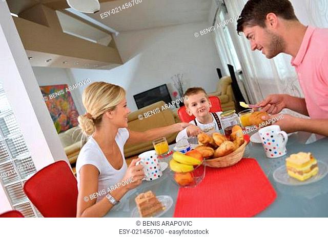 family have healthy breakfast at home
