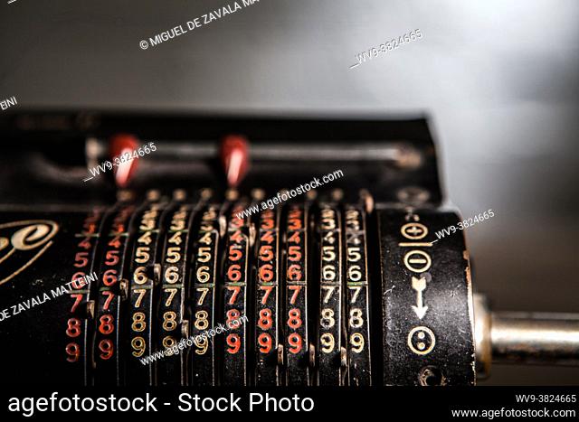 Old manually operated calculator. Detail of the numbers