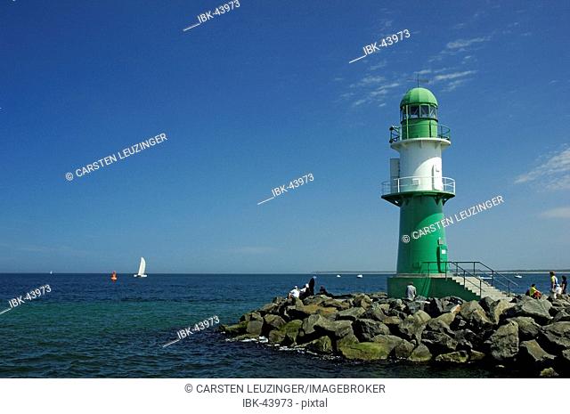 Lighthouse at the entry to Rostok harbour at Warnemuende Germany