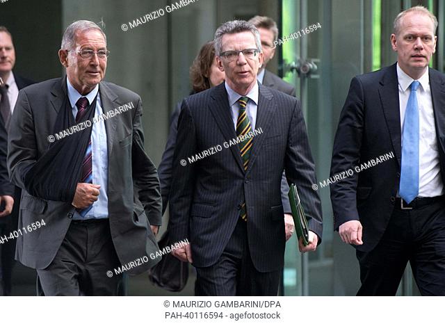 German Defence Minister Thomas de Maiziere (C) arrives at a special meeting of the defence committee on controversies concerning his handling of a failed...