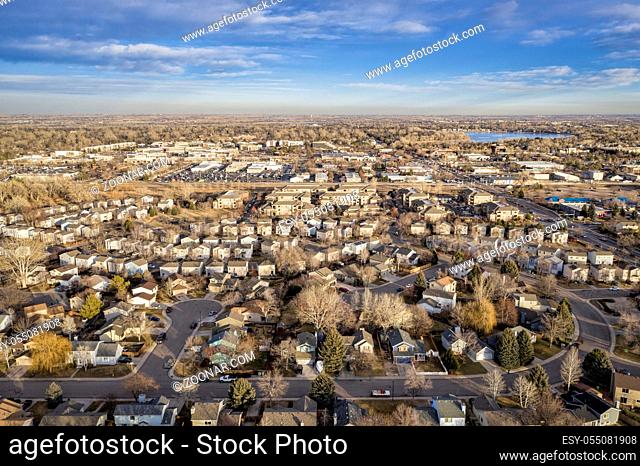 typical residential neighborhood and shopping aera along Front Range of Rocky Mountains in Colorado, aerial view of Fort Collins towards plains