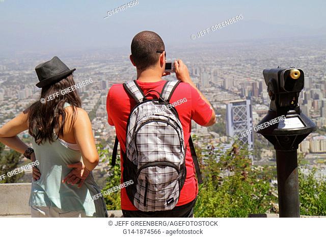 Chile, Santiago, Cerro San Cristobal, Terraza Bellavista, view from, Providencia, scenic overlook, city skyline, building, skyscraper, distance, haze, Hispanic