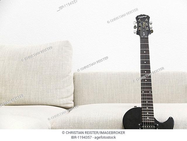 Sofa with electric guitar