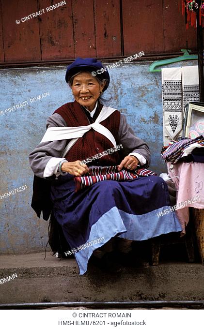 China, Yunnan province, Lijiang, Naxi woman