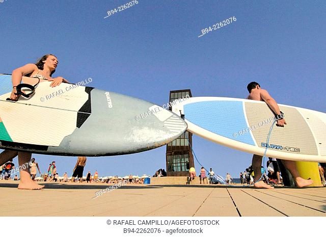 Surf boards. Sculpture 'The wounded star' L'estel ferit by Rebecca Horn at Barceloneta beach, 1992. Barcelona, Catalonia, Spain