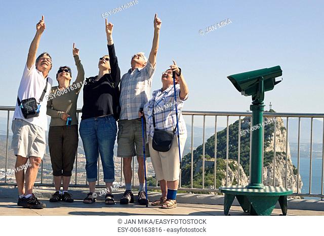 Portrait of happy excited tourists people on the Rock of Gibraltar