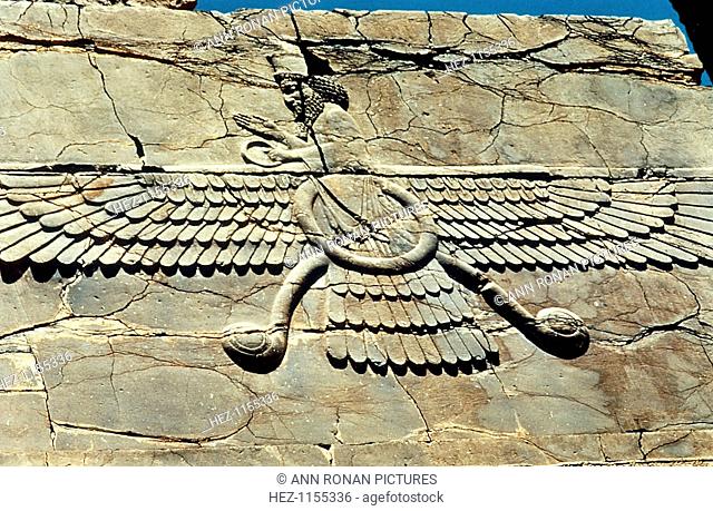Ahura Mazda (c-500). Winged symbol of Ahura Mazda (Ormazd, Ormuzd, Ohrmazd), Lord of Wisdom, supreme god of the Zorastrian (Zarathustrian) religion of Persia