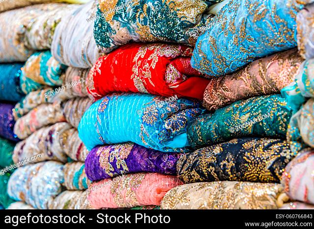 Traditional oriental cloth sold in a store in old town Dubai, United Arab Emirates