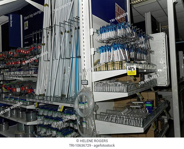 Electrical Fittings On Shelves In D.I.Y Store Showing Trunking, Cables, Sockets And Switches