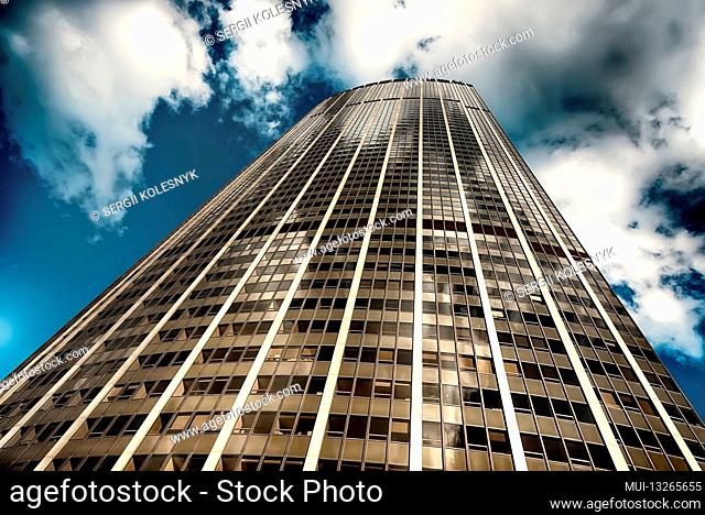View on Montparnasse Tower and sky with clouds in Paris, France