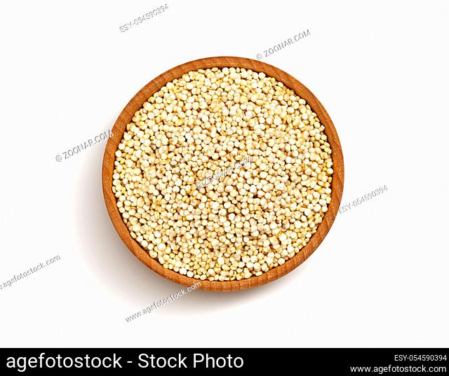 Wooden bowl of quinoa seeds isolated on white background with clipping path, close up, top view